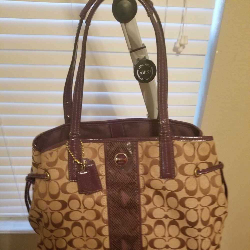 Coach purse with purple straps